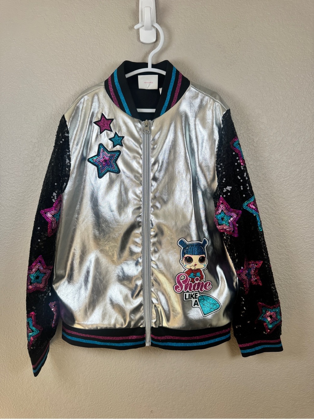 L.O.L. Surprise! Silver Bomber Jacket with Black Sequin Star Sleeves
